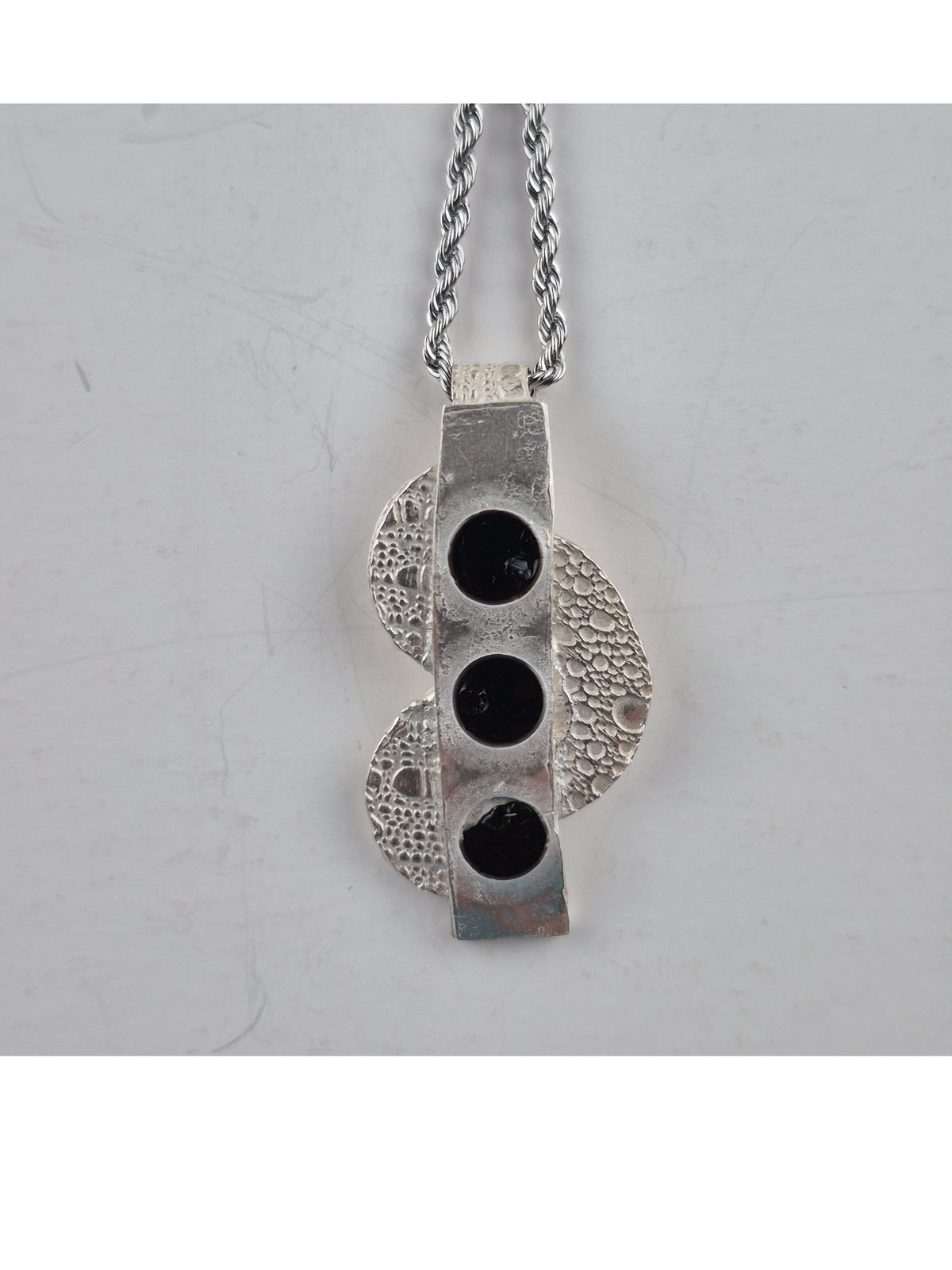 Fine silver pendant with three caboshons