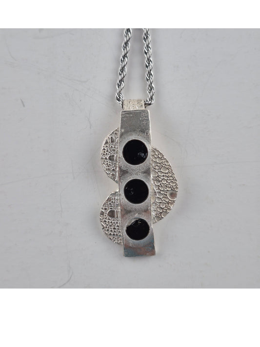 Fine silver pendant with three caboshons